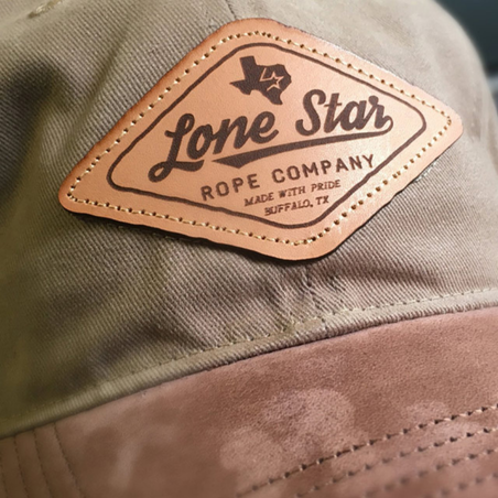 Richardson custom decoration. Our Etched leather offers a more natural, rugged look than Debossed leather. Ideal for moderate to complex logos with small detail that can be transferred easily to a one-color application. Logos are laser etched onto the applique. Genuine and faux leather available.